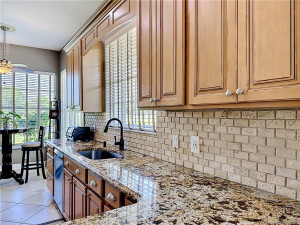 Eat in kitchen with a pass through to the dining room area. Very light and airy overlooks the water and golf course.