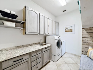 And Mud room with lots of storage. Off the garage area. Includes the washer and dryer/