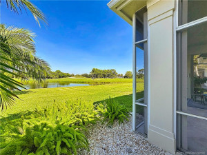 Water and golf course views. Screened patio.