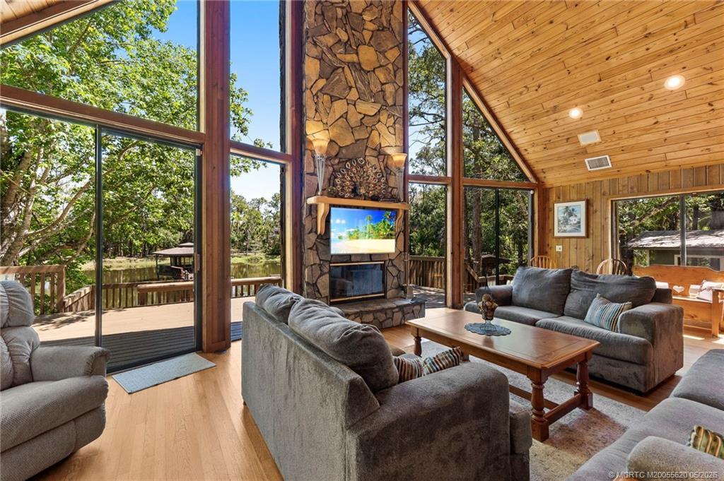 Great room with Fireplace at 4558 SW Cherokee Street, Palm City