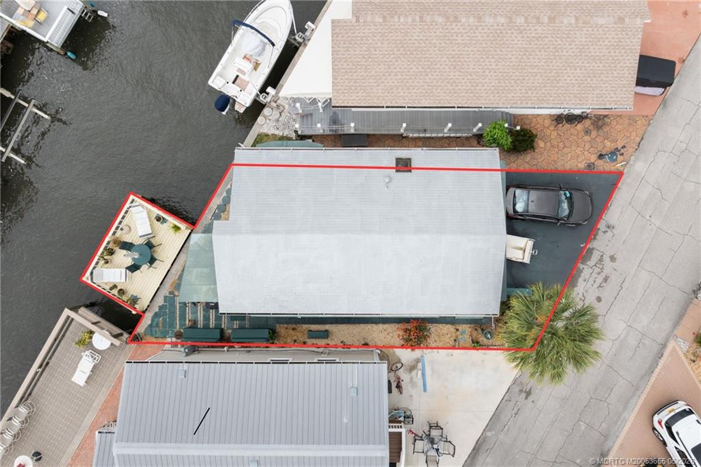 Aerial View with dock at 140 Nettles Boulevard, Jensen Beach
