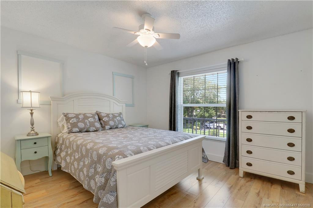 Comfortable guest accommodations with neutral finishes, wood-look flooring, and