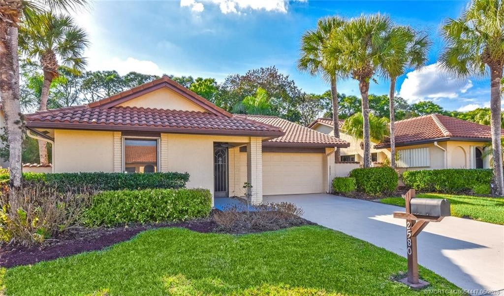 Photo 1 at 2580 SW Bobalink Court, Palm City