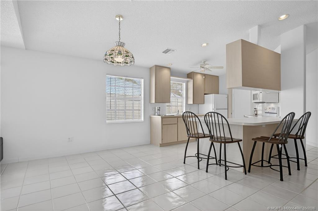 Open airy kitchen with eating island