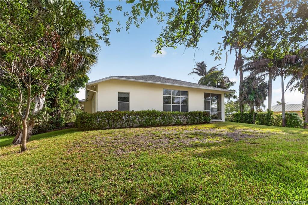 Elevated, treed lot on 1/3 acre at 814 SW 29th Street, Palm City
