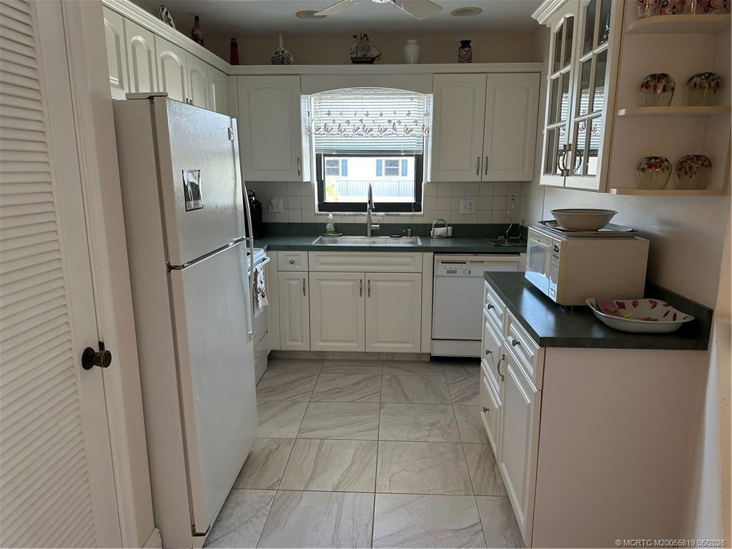 Updated kitchen at 755 Saturn Street F205, Jupiter
