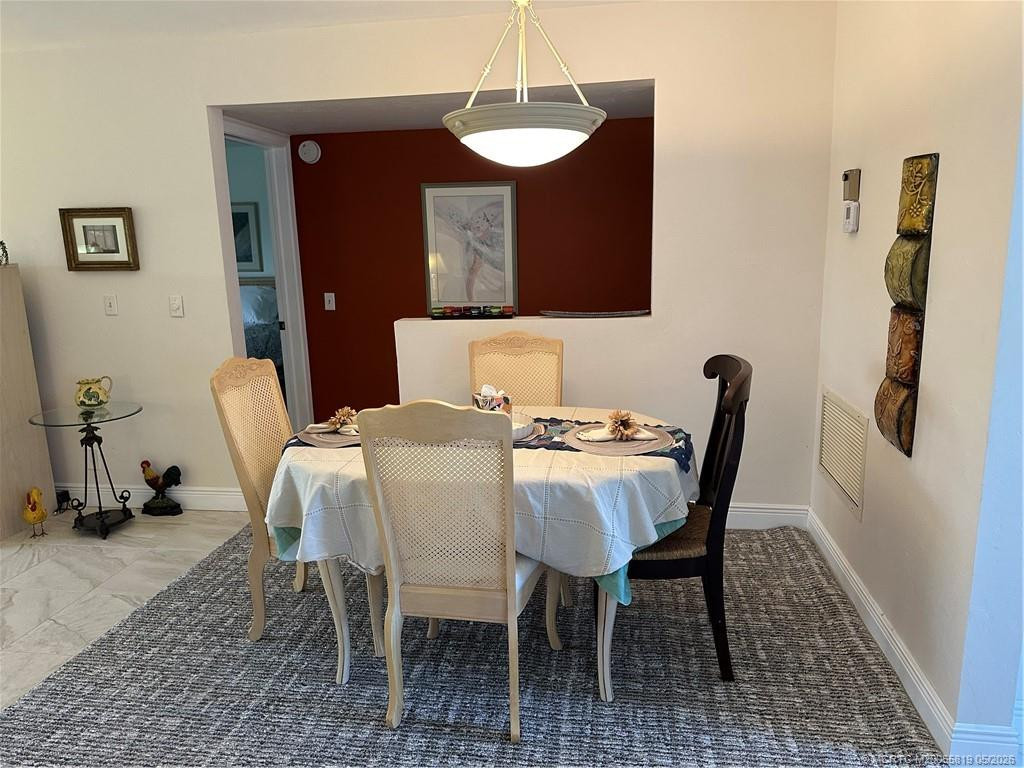 Separate dining area at 755 Saturn Street F205, Jupiter