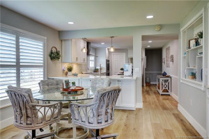Dining toward kitchen with breakfast bar