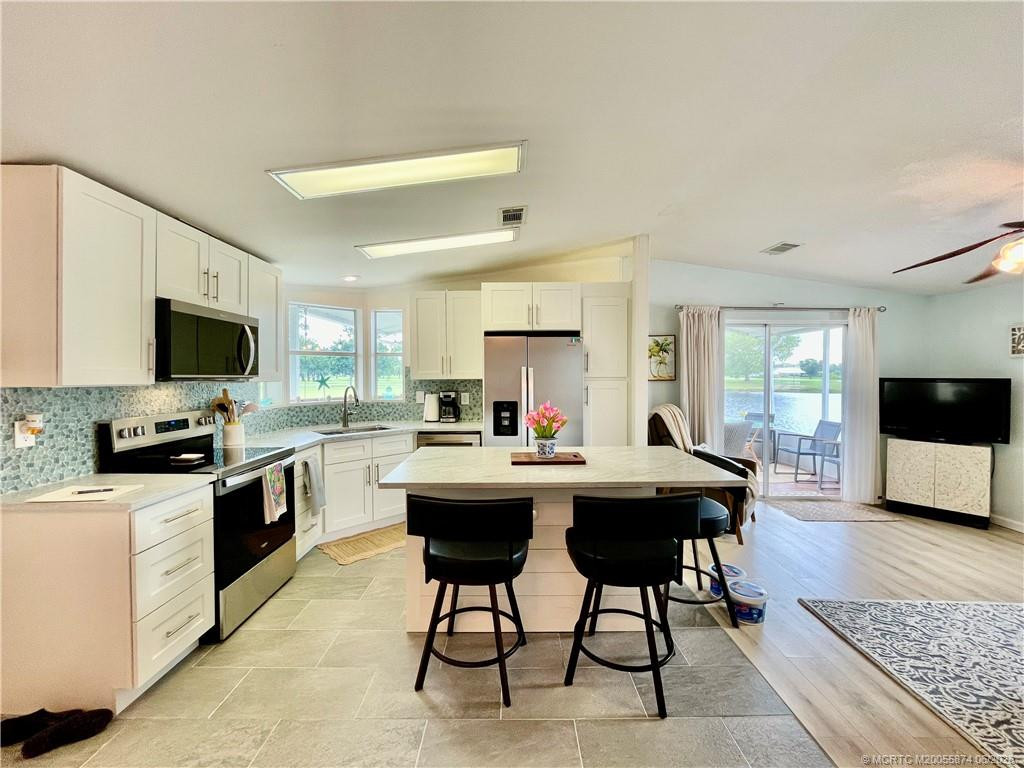 Recently remodeled Kitchen. Quartz countertops, appliances & cabinets.