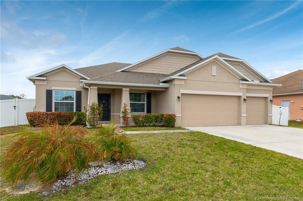 Property photo for 1017 SW Fenway Road, Port St. Lucie, FL 34953