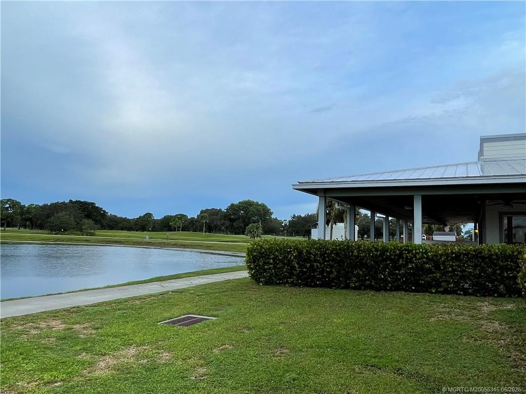 Outpost outdoor seating with views of lake & golf course.