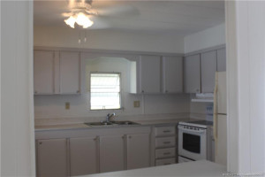 plenty of storage space in nice off white cabinetry