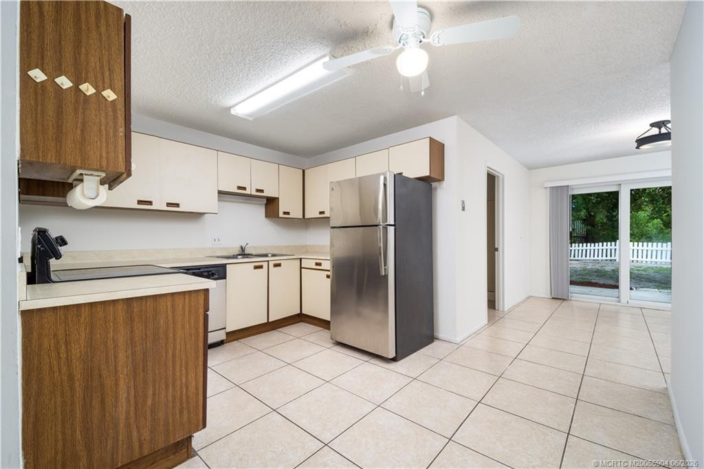 Functional kitchen with stainless appliances.