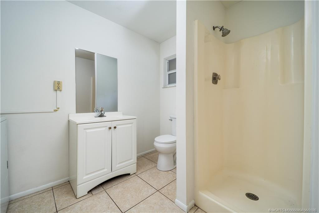 Guest bathroom updated with walk-in shower.