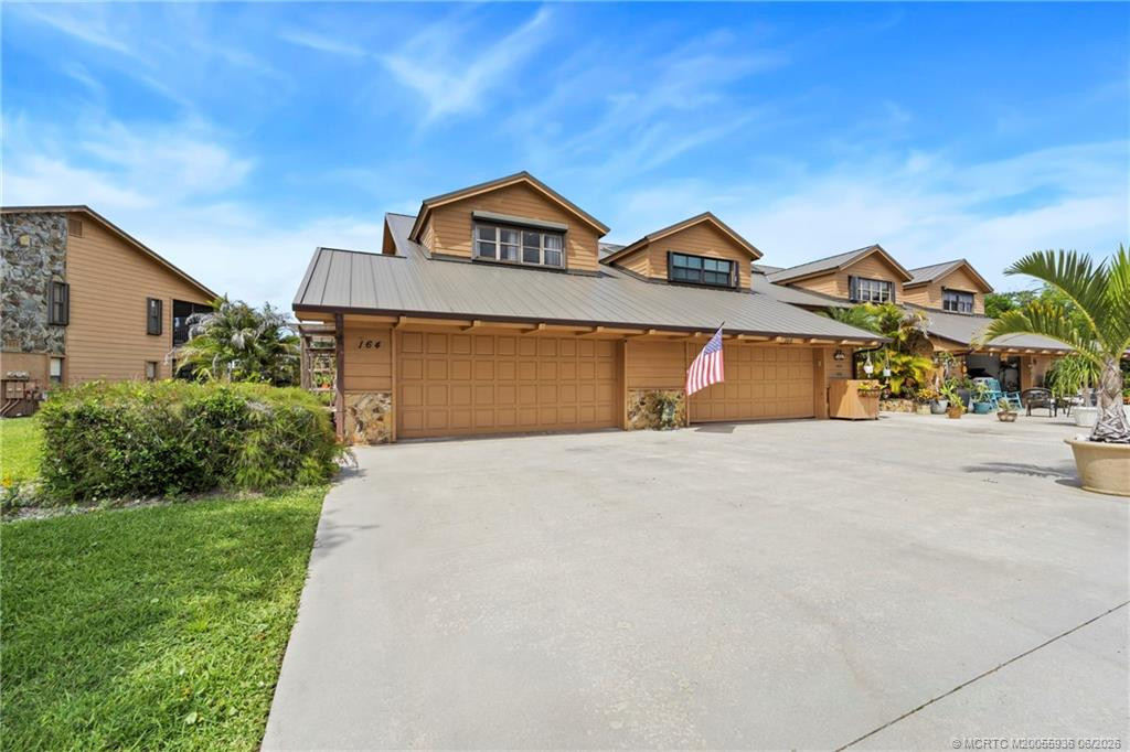 Front with long driveway.