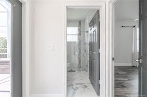 hallway between guest bedrooms
