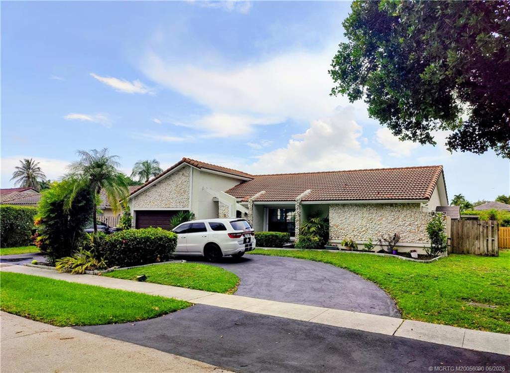 Photo 1 at 9780 NW 10th Street, Plantation