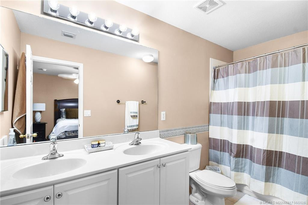 Main Bathroom at 3010 SE Lexington Lakes Drive, Stuart
