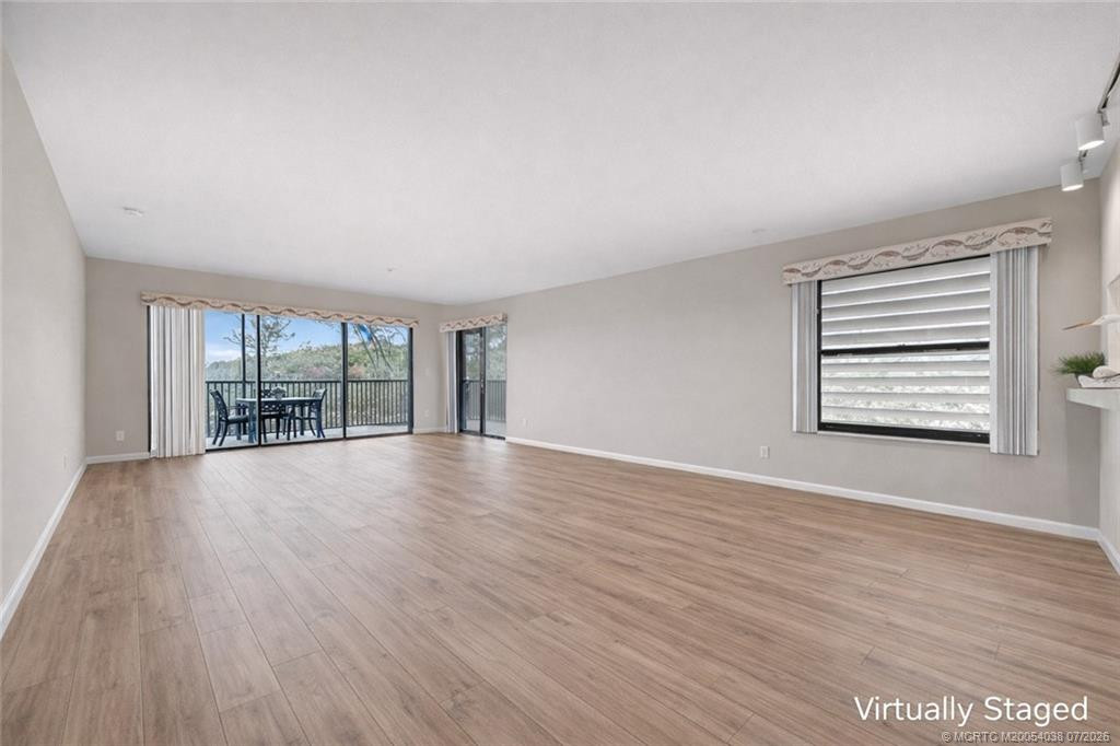 virtually staged flooring at 2491 NE Ocean Boulevard 106, Stuart