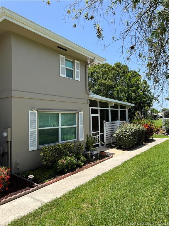 Entry to Covered Patio Area at 3505 SW Sunset Trace Circle, Palm City