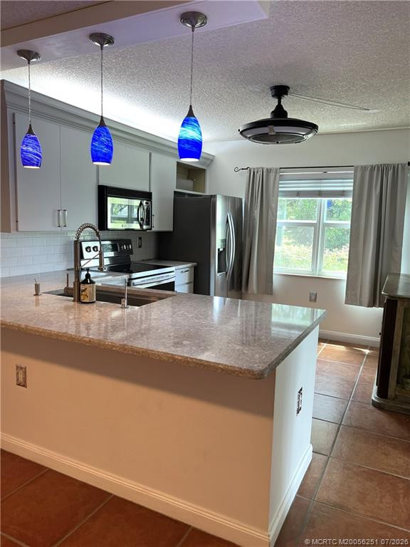 Kitchen 13' x 11' at 3505 SW Sunset Trace Circle, Palm City