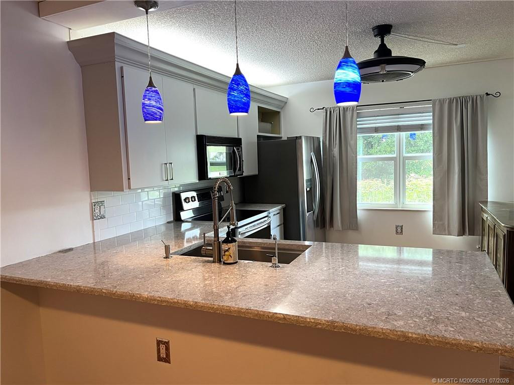 Kitchen at 3505 SW Sunset Trace Circle, Palm City