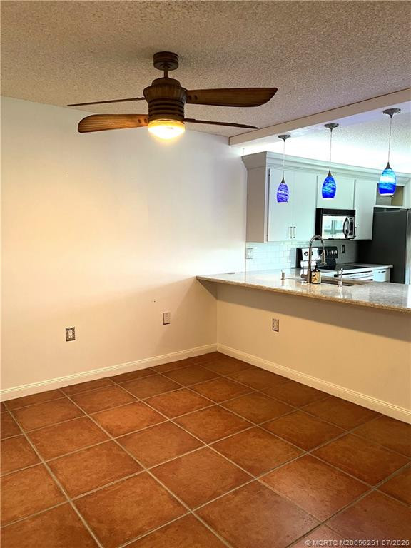 Dining off of Kitchen at 3505 SW Sunset Trace Circle, Palm City