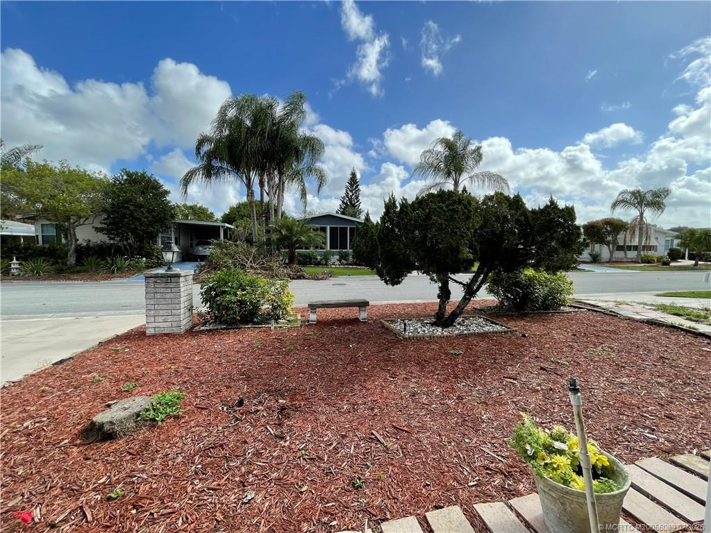 Professionally landscaped front yard.