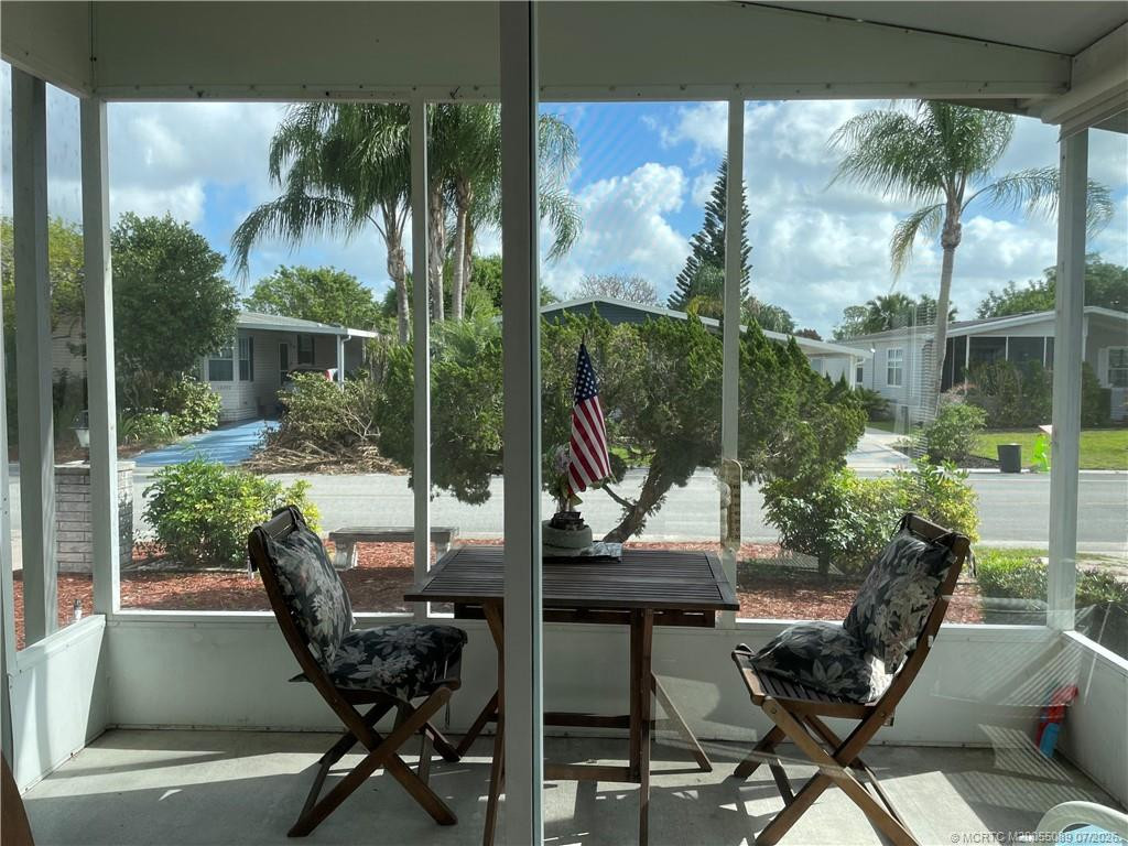 Screened lanai for outdoor relaxation.