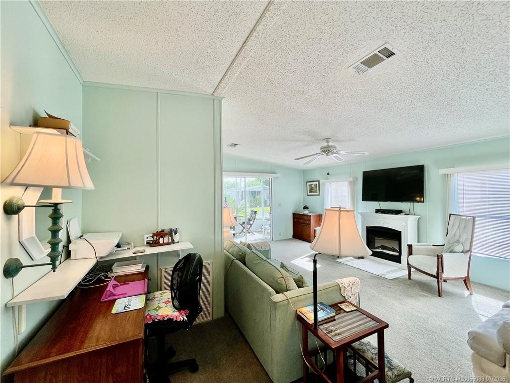 Additional space in living room for a desk, etc.