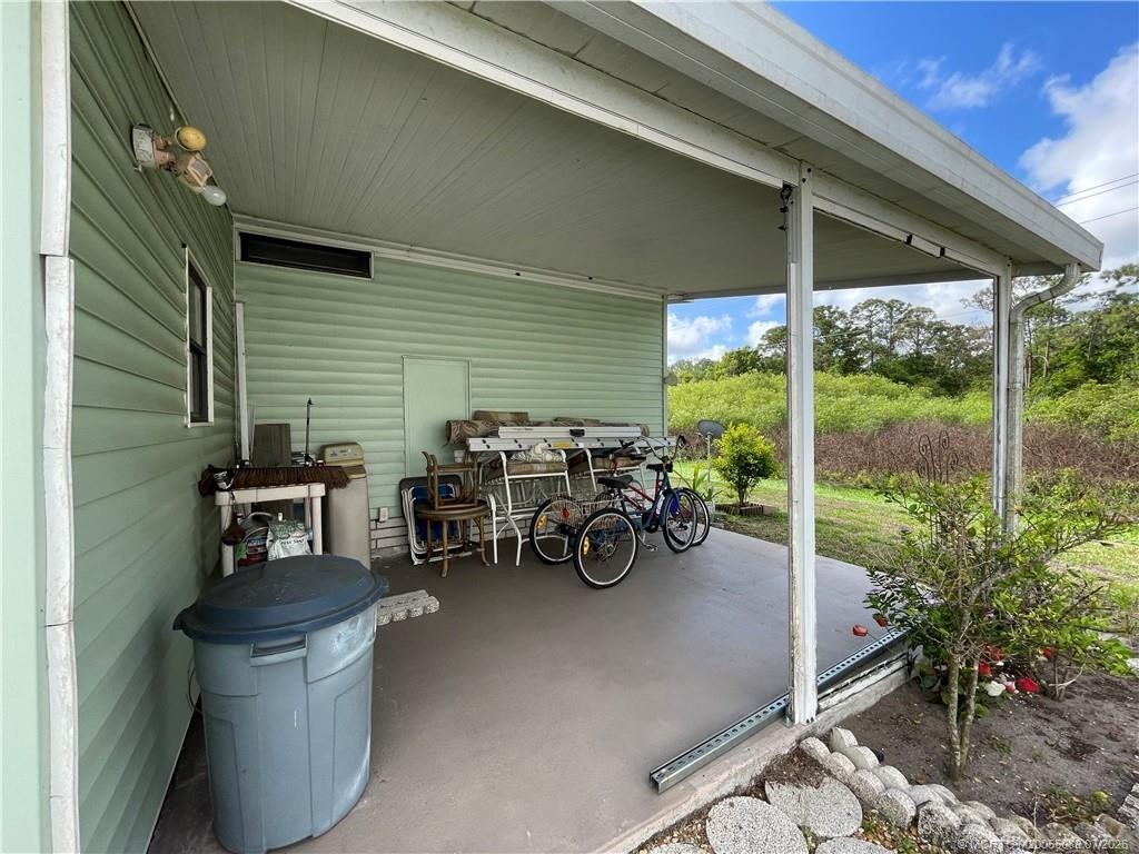 Additional patio area. Keep your bicycles & fishing rods here.