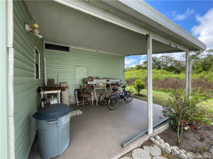 Additional patio area. Keep your bicycles & fishing rods here.