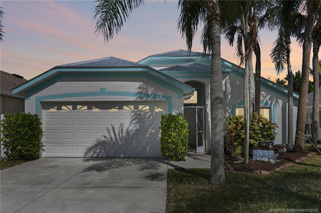 Photo 3 at 713 NW Waterlily Place, Jensen Beach