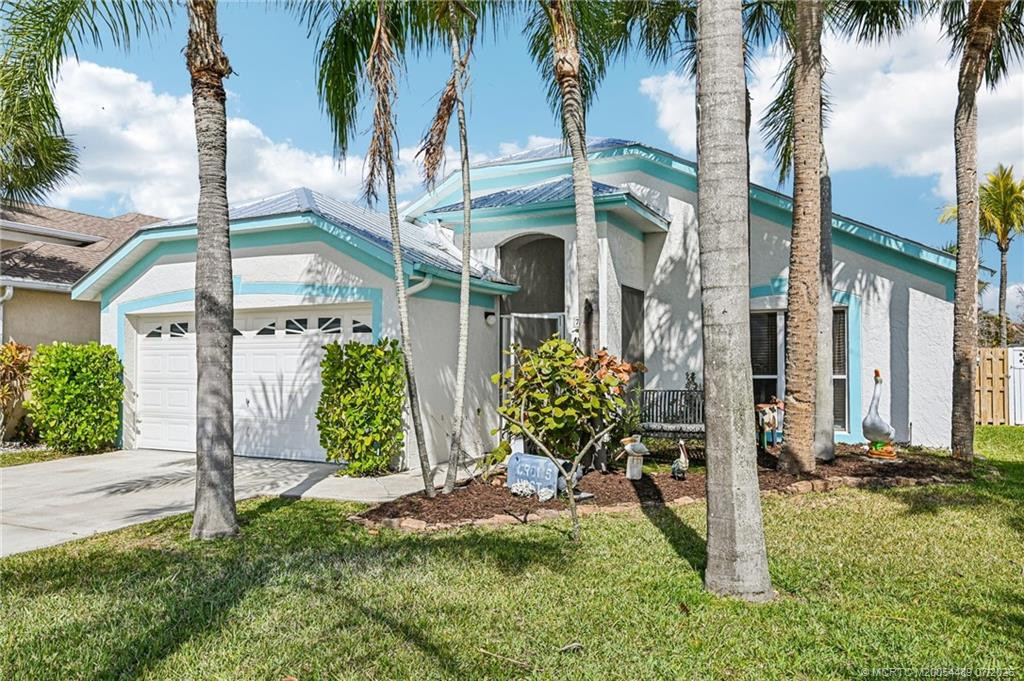 Photo 4 at 713 NW Waterlily Place, Jensen Beach
