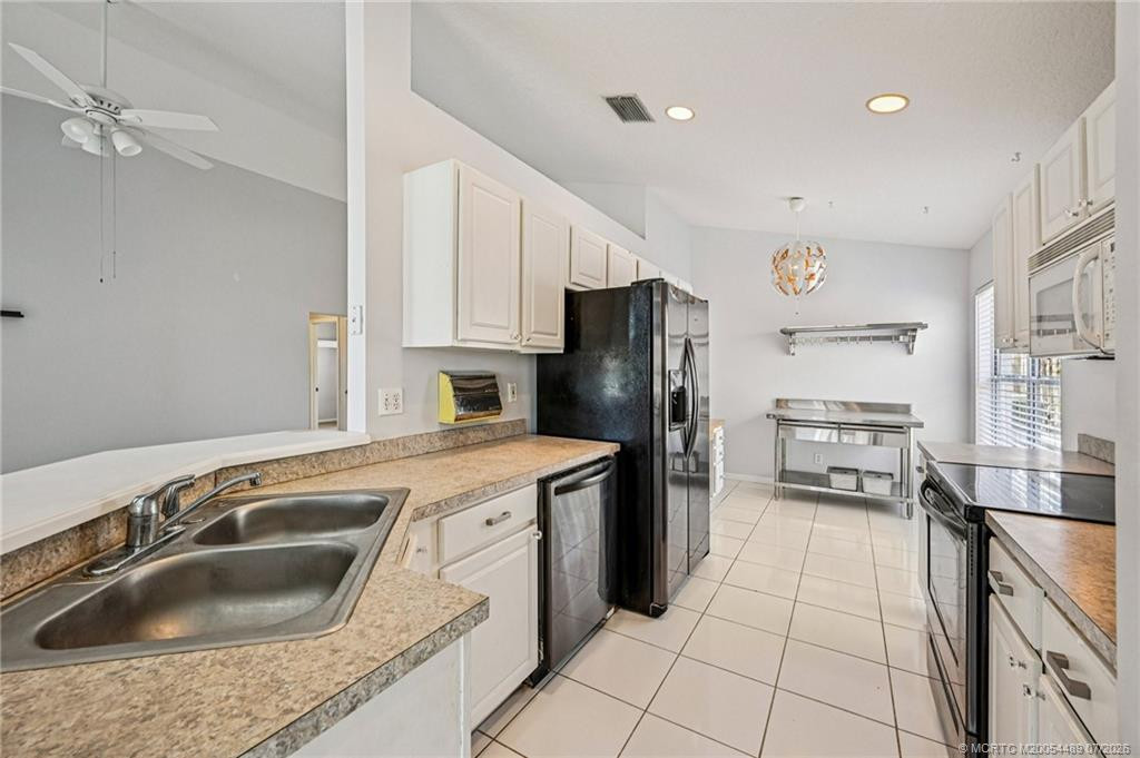 Photo 8 at 713 NW Waterlily Place, Jensen Beach