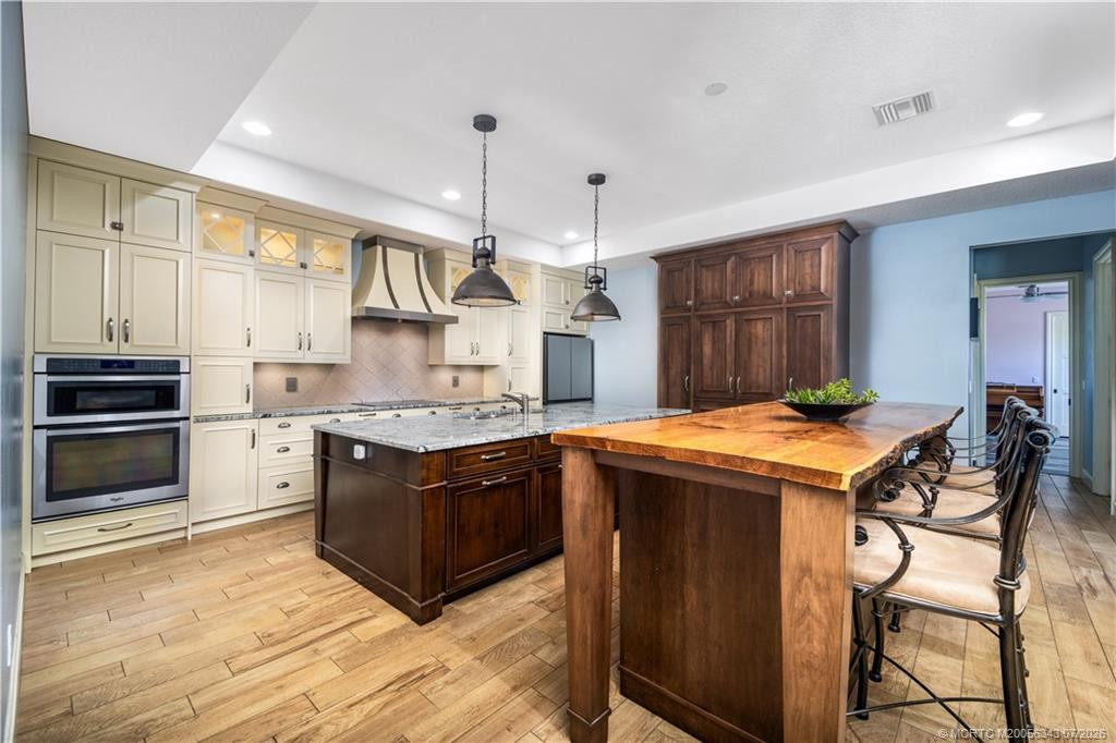 Chef Kitchen with live edge bartop
