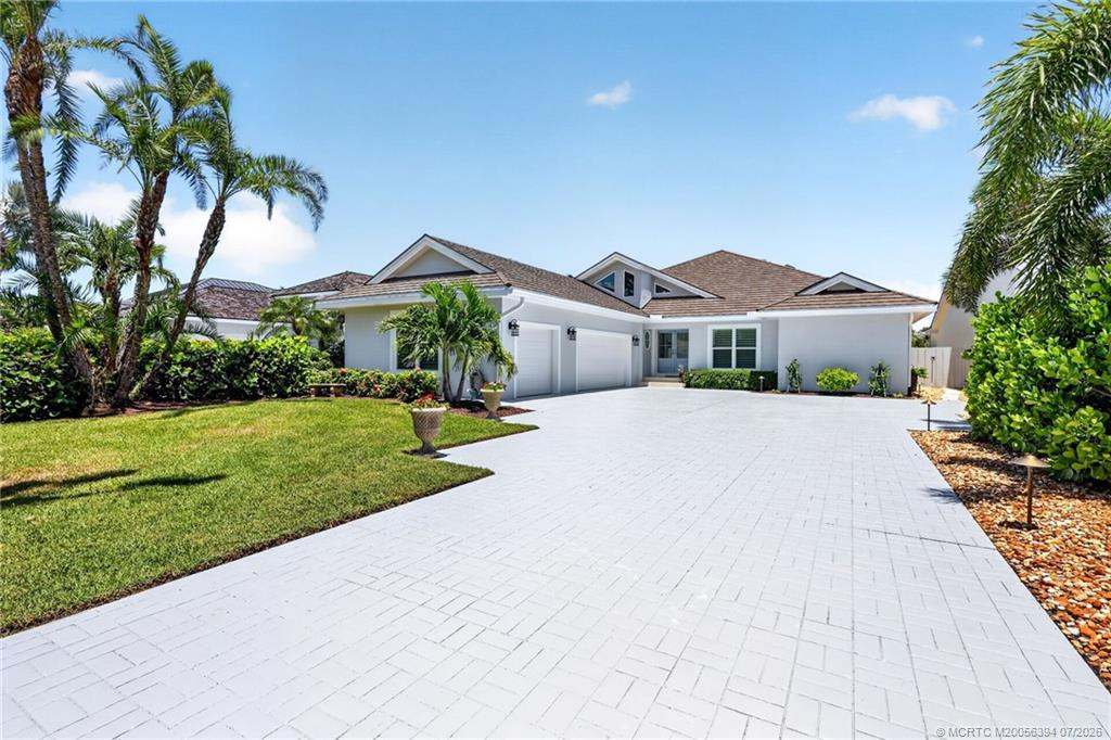 Ample parking in this expanded driveway at 6943 SE Harbor Circle, Stuart
