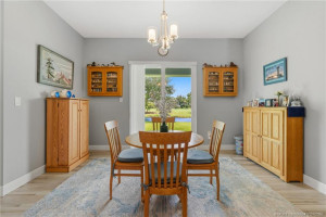 Dining room adjacent to kitchen.