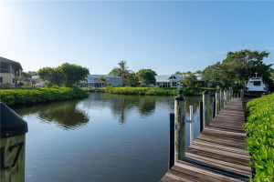 Dock walkway for taking a stroll and for tying up your boat. Slips are available for rent through the condo association on a first-come, first-serve basis for boats 30' and under.
