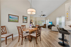 dining room looking to living room and sliding doors.