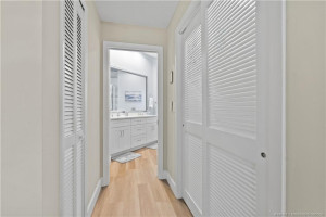 Master closets leading to the bathroom