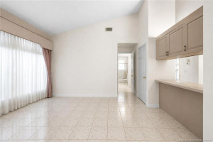 AI removal of furniture in den/easy possible 3rd bedroom.