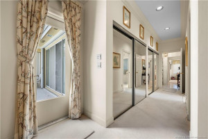 Extensive closet space and private entrance to pool lanai.