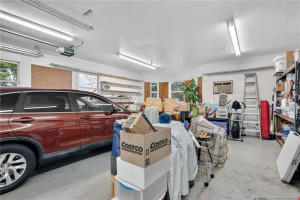 Oversized 2-car garage with built-in shelves