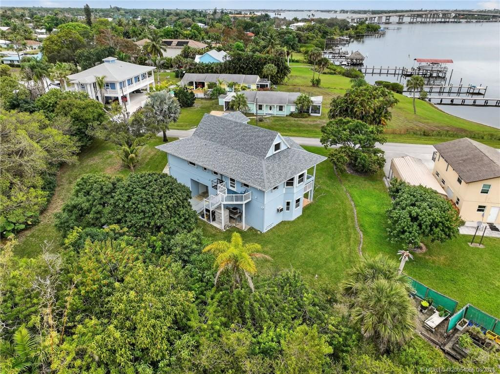 1/2 acre of lush landscaping and fruit trees