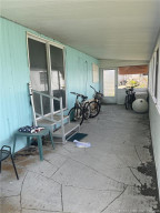 Enclosed side porch