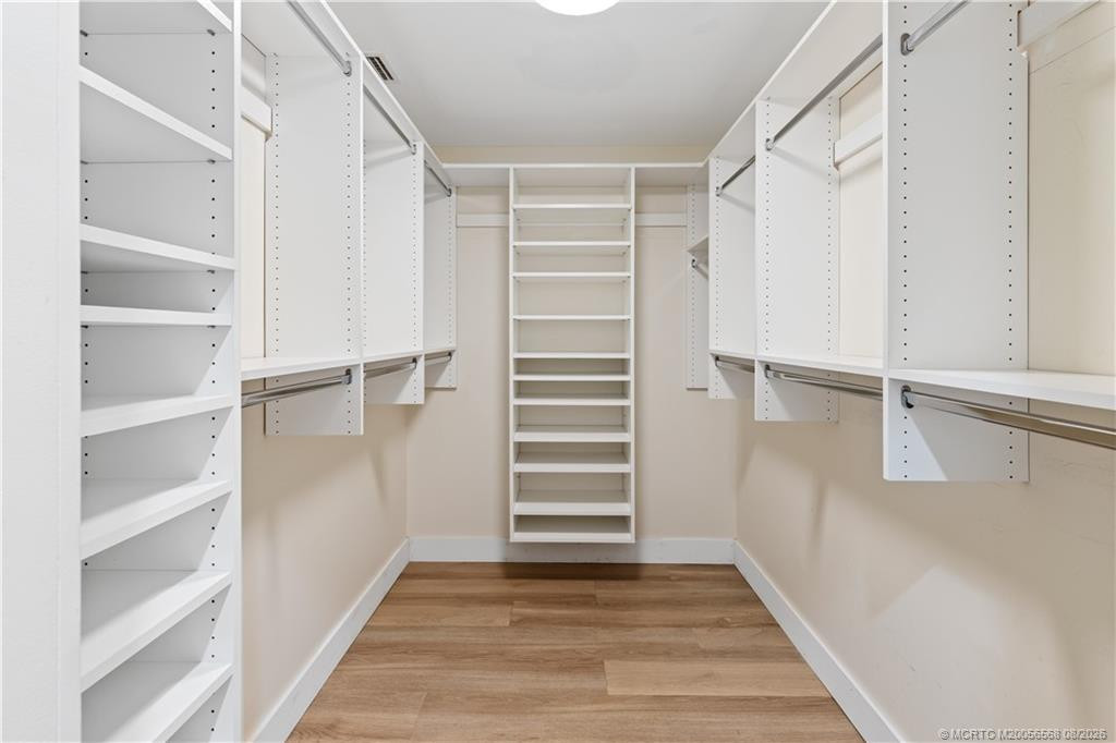 Primary Bedroom Walk in closet