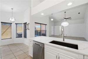 Updated kitchen with quartz countertops and stainless-steel appliances