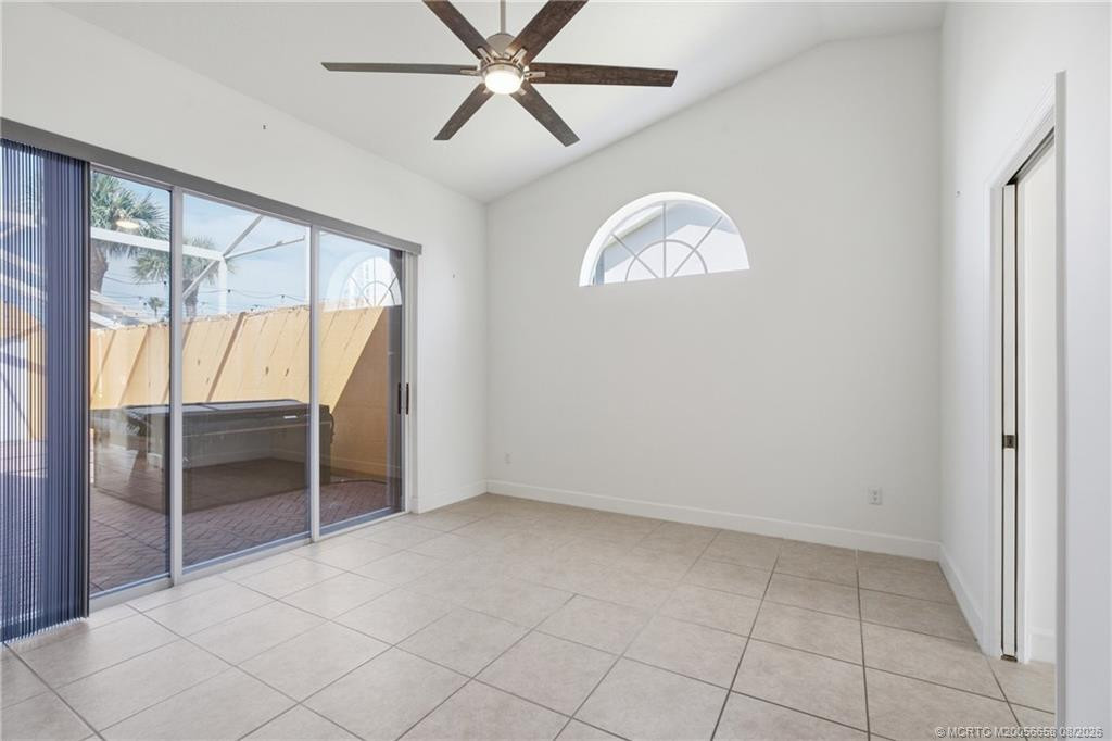 Large primary suite with lots of light and views of the patio.