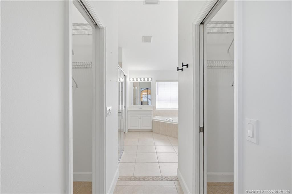 His and hers closets in the primary suite.